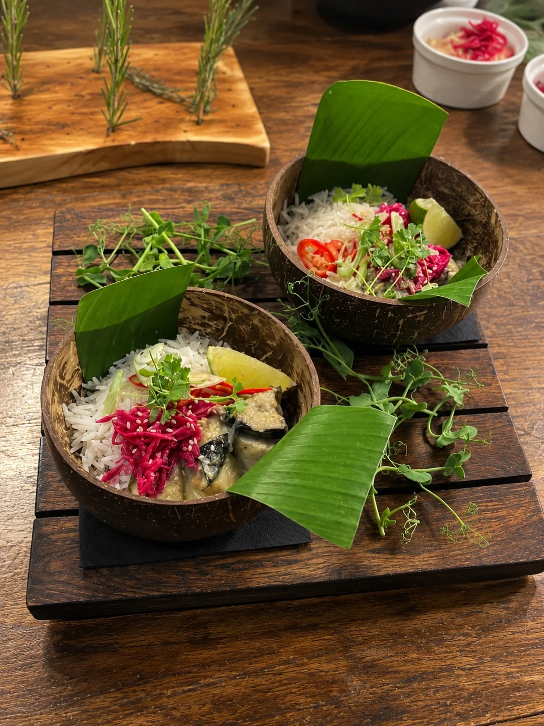 Asian-inspired bowls with rice, vegetables and lime