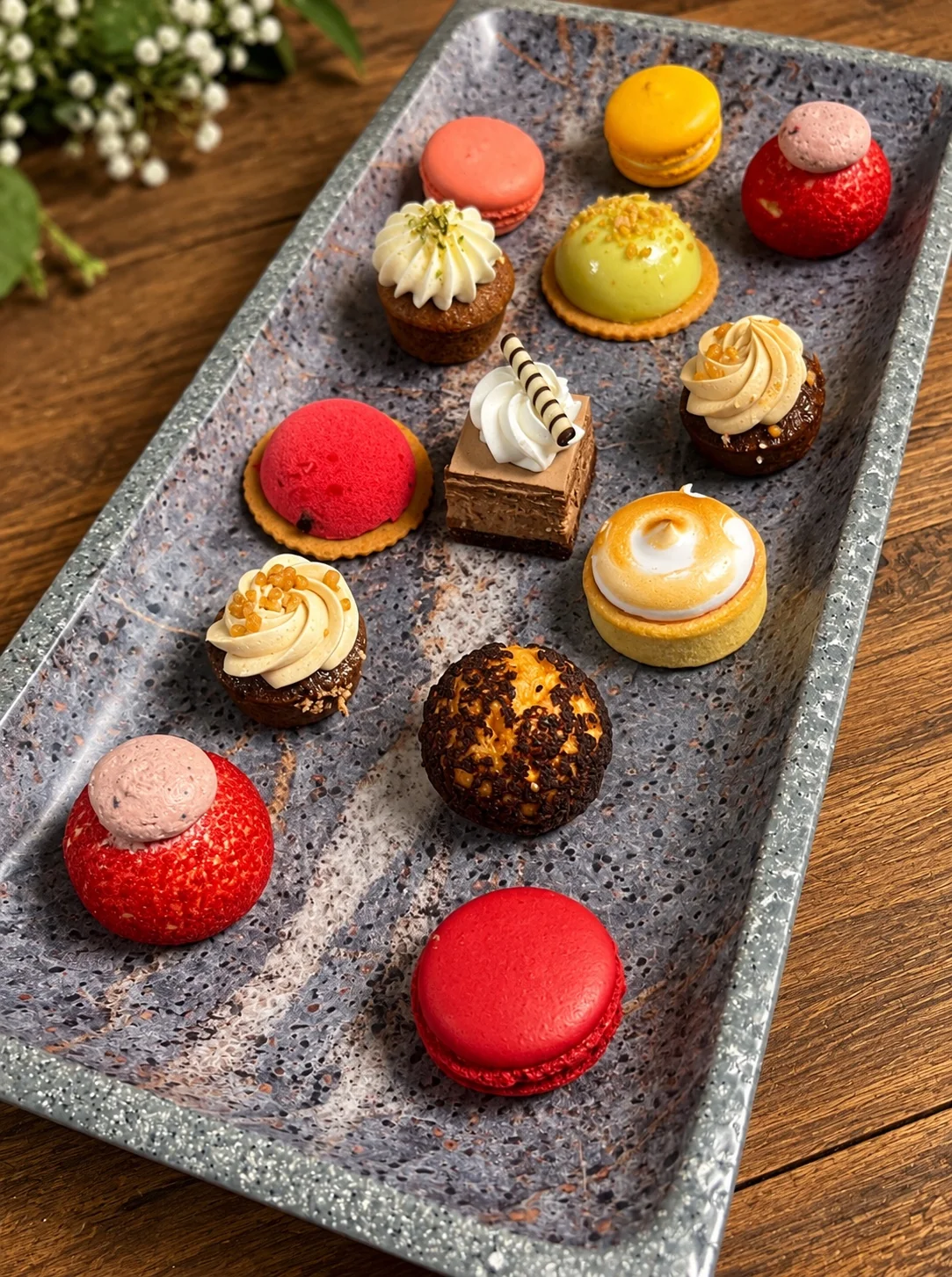 A colourful collection of miniature patisserie
