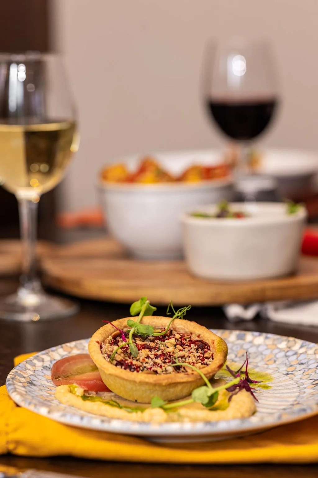Savoury tart served in a restaurant dining setting